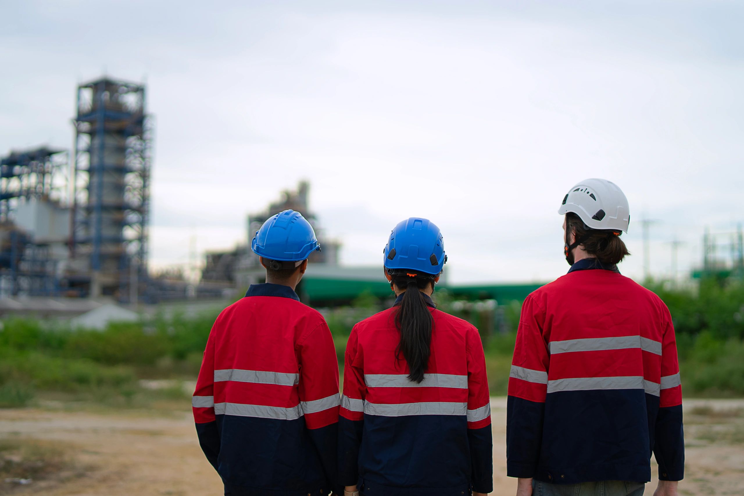 Industrial team working at a large facility